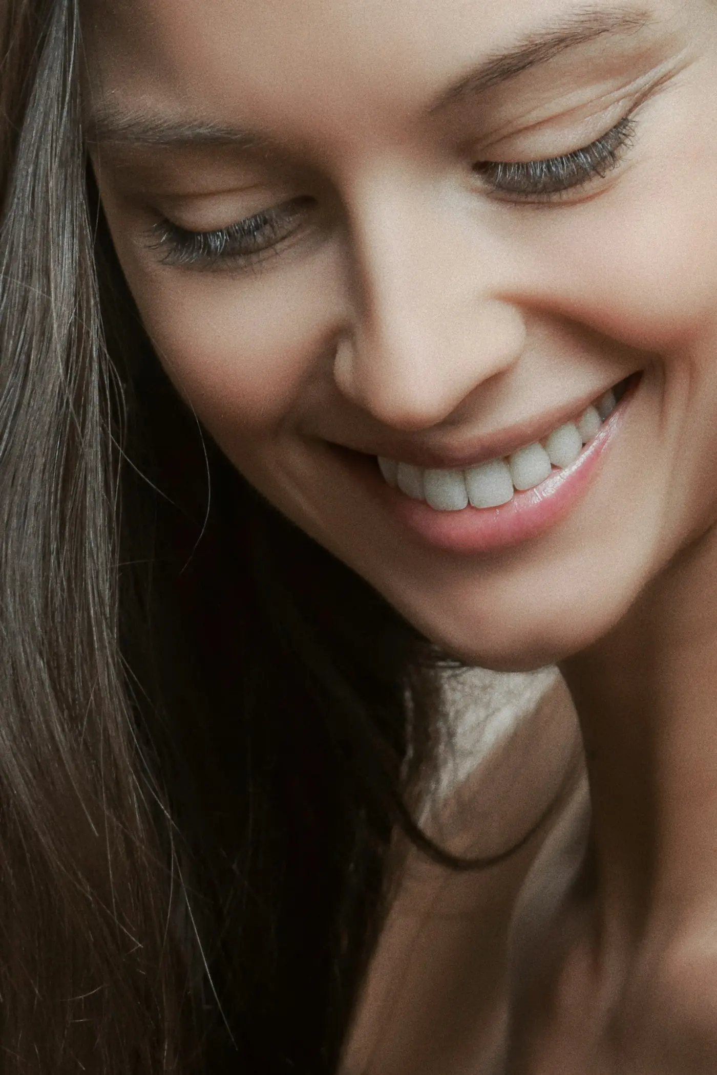 A woman smiling