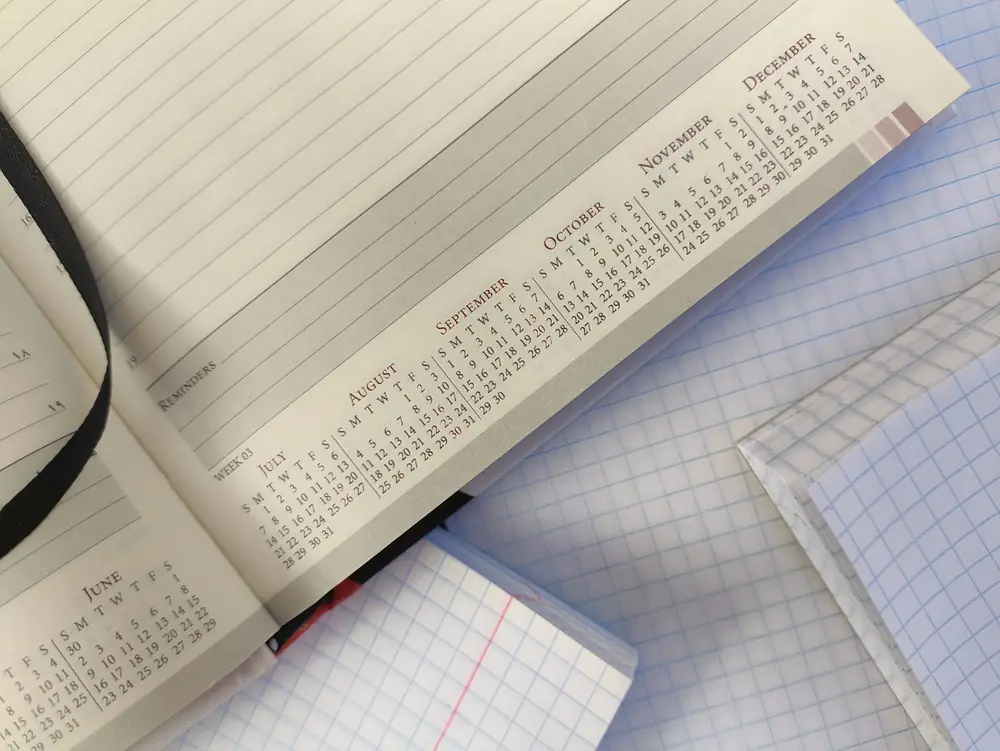 An open planner showing the months ahead