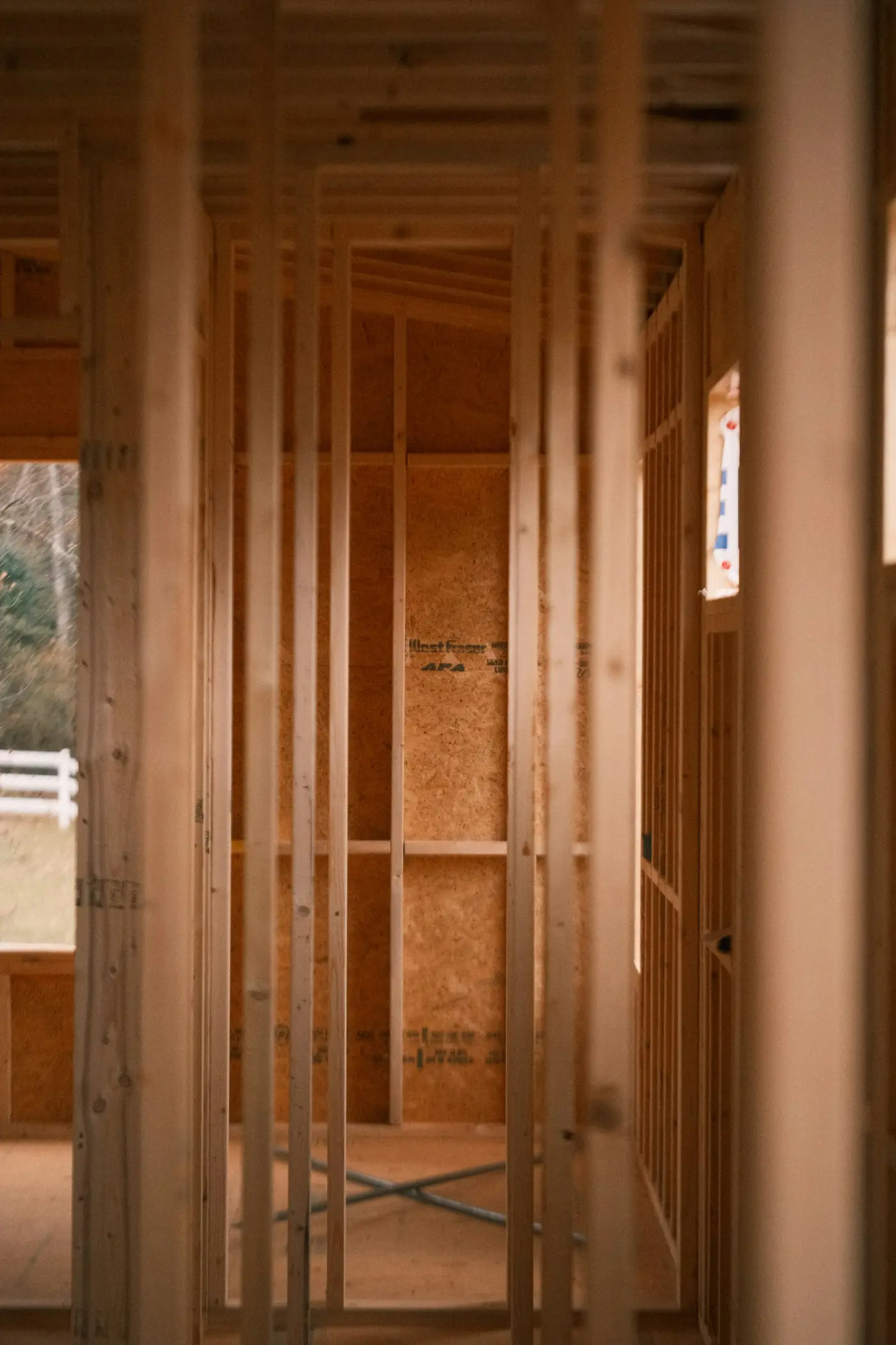 Fresh wood framing inside a house being rebuilt