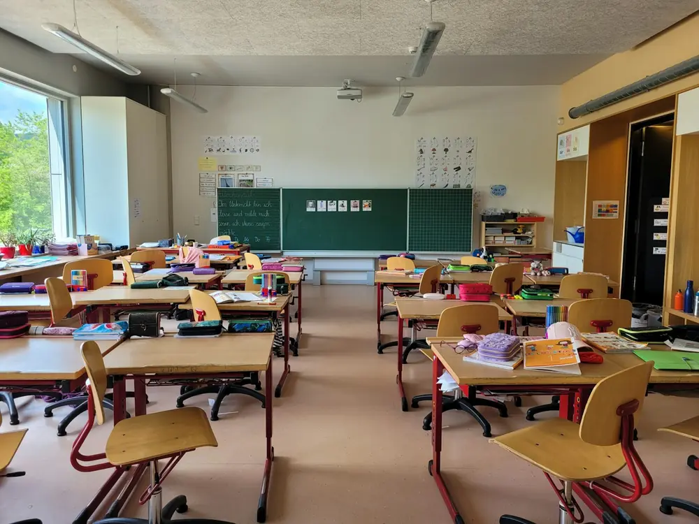 A classroom of desks before the children arrive