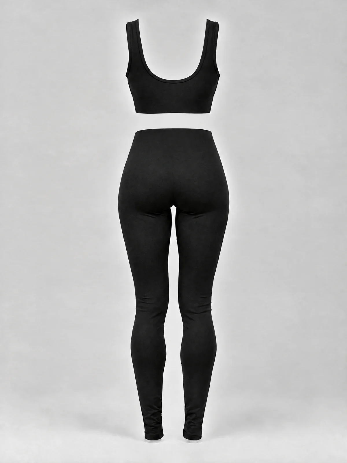 The back of the black set: plain, seamless, a high waistband