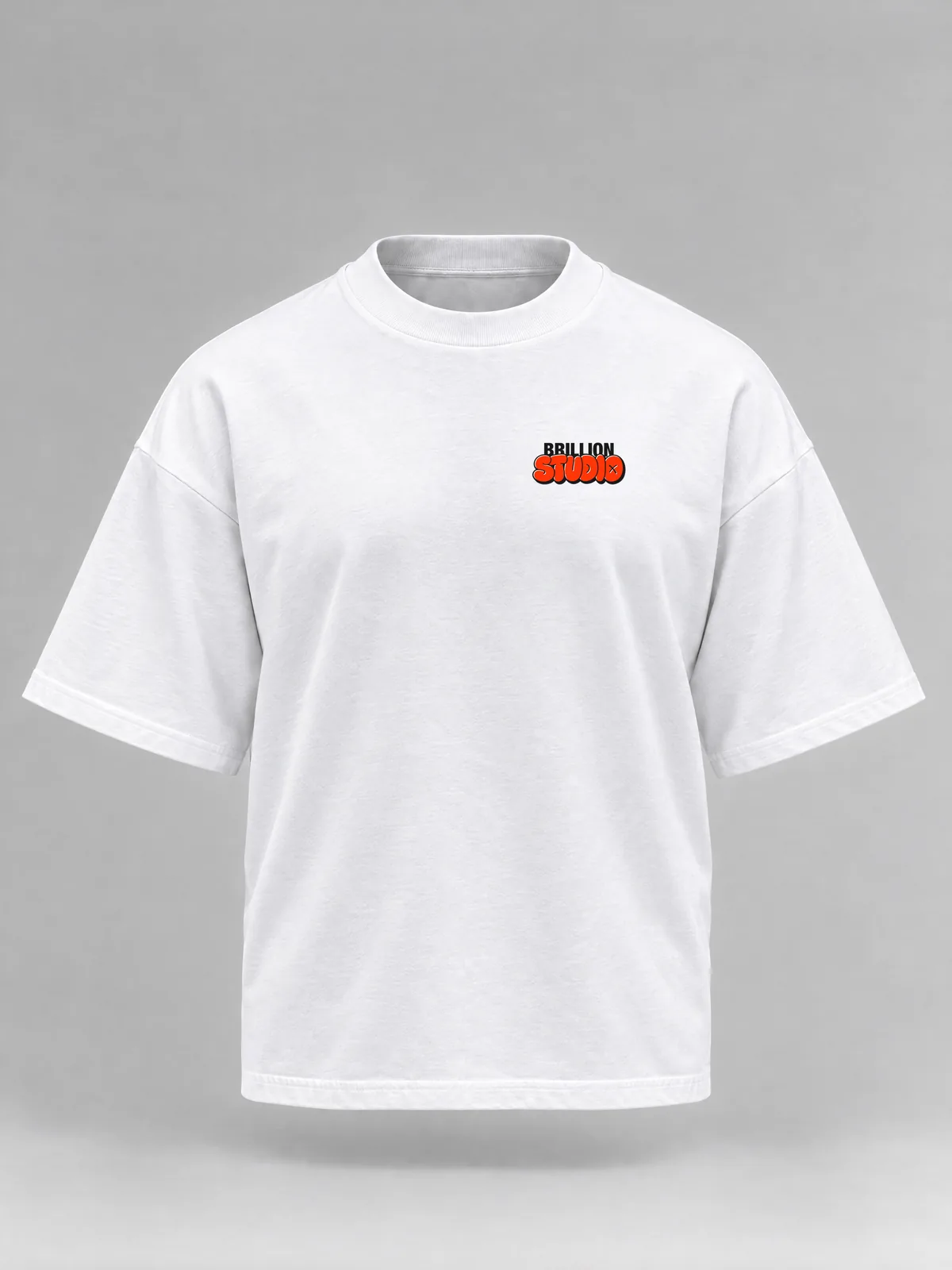 The white Brillion Studio tee, boxy and short-sleeved, with the STUDIO print small on the left chest