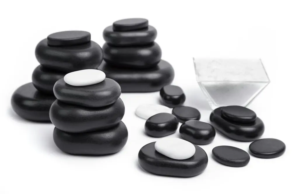 A stack of black massage stones